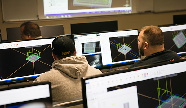 Students work on programming in computer lab